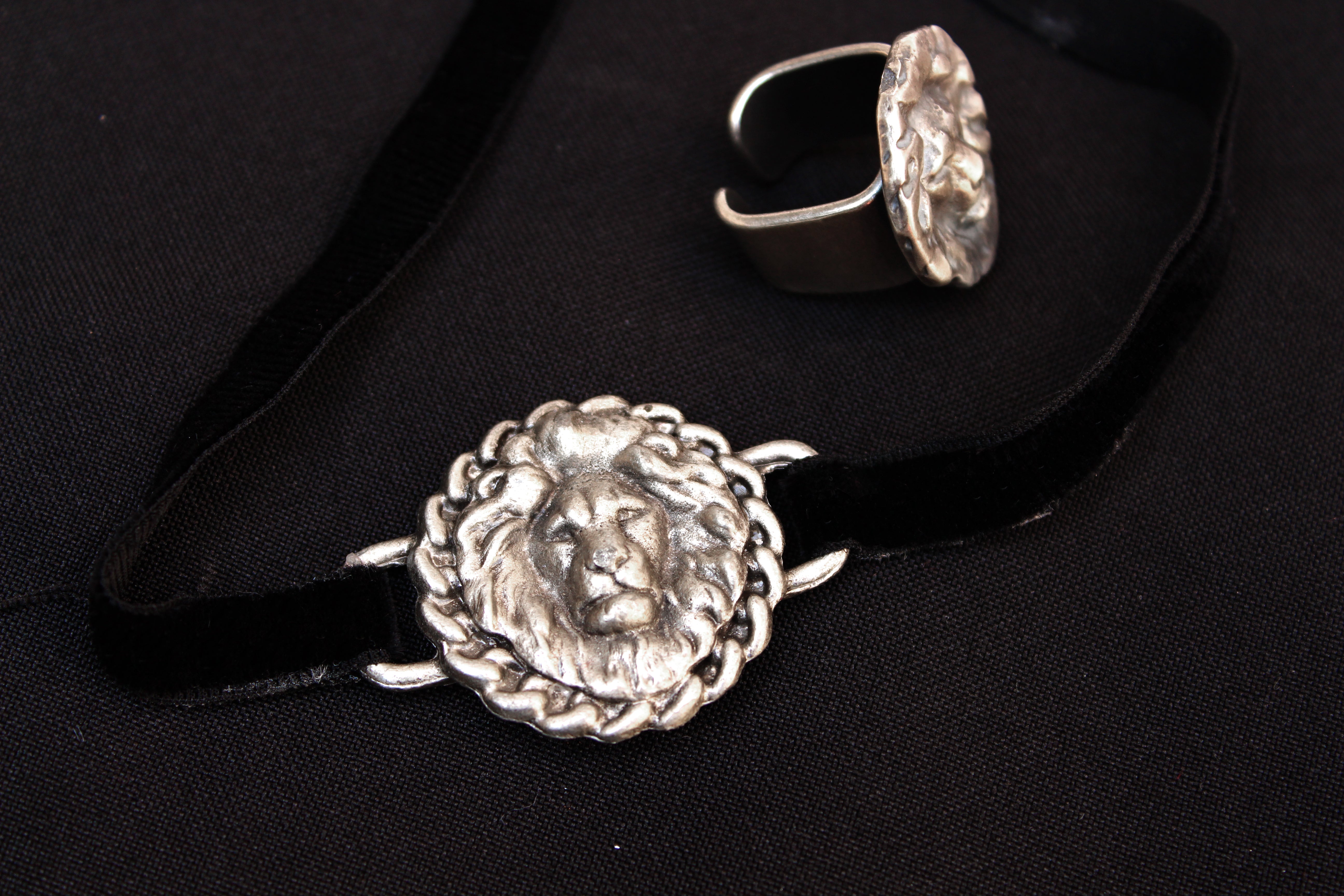 orgada's black fierce leono velvet choker and lion ring on a black background 
