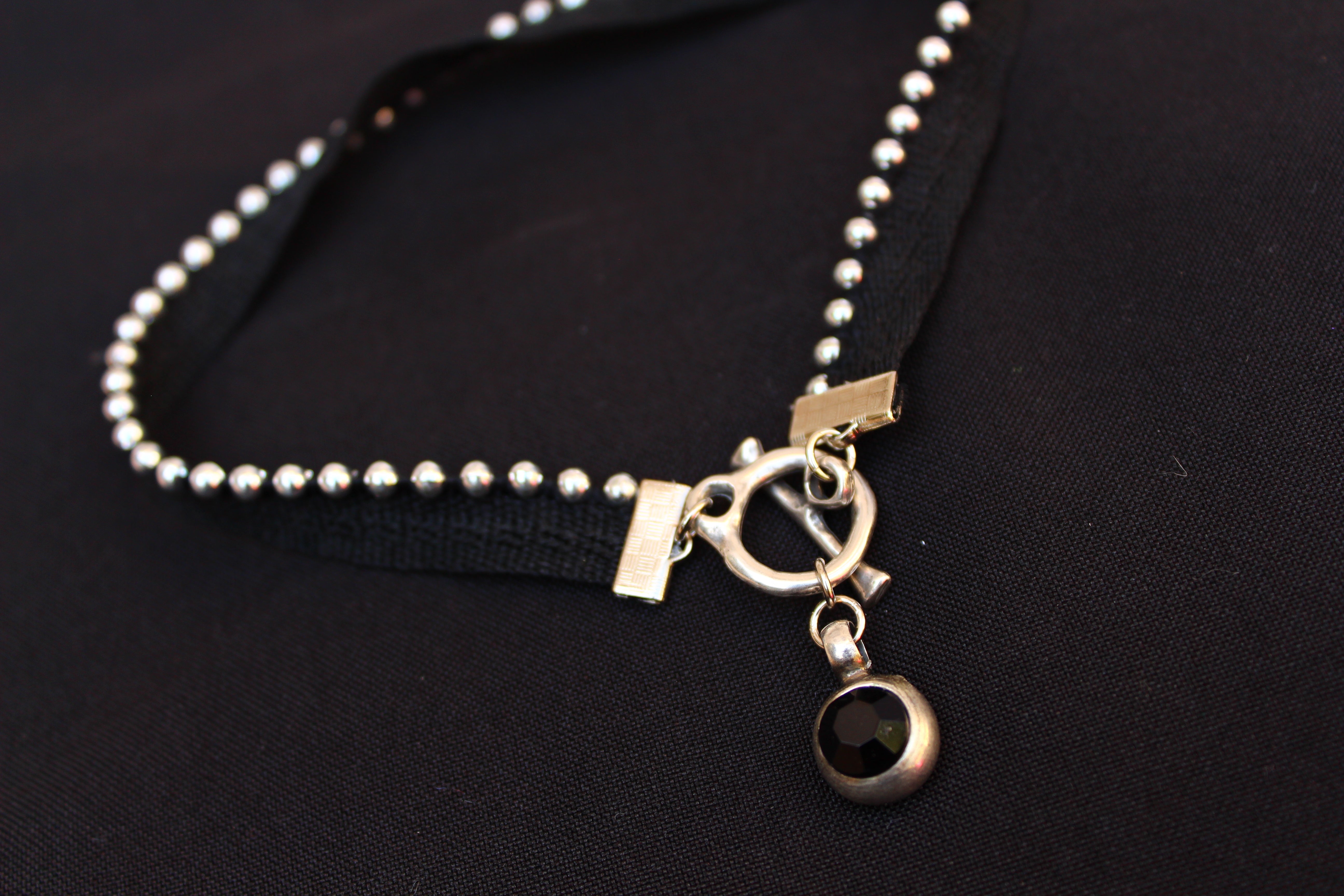 orgada's black grungy and sexy Spot Choker on a black background