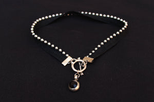 orgada's black grungy and sexy Spot Choker on a black background